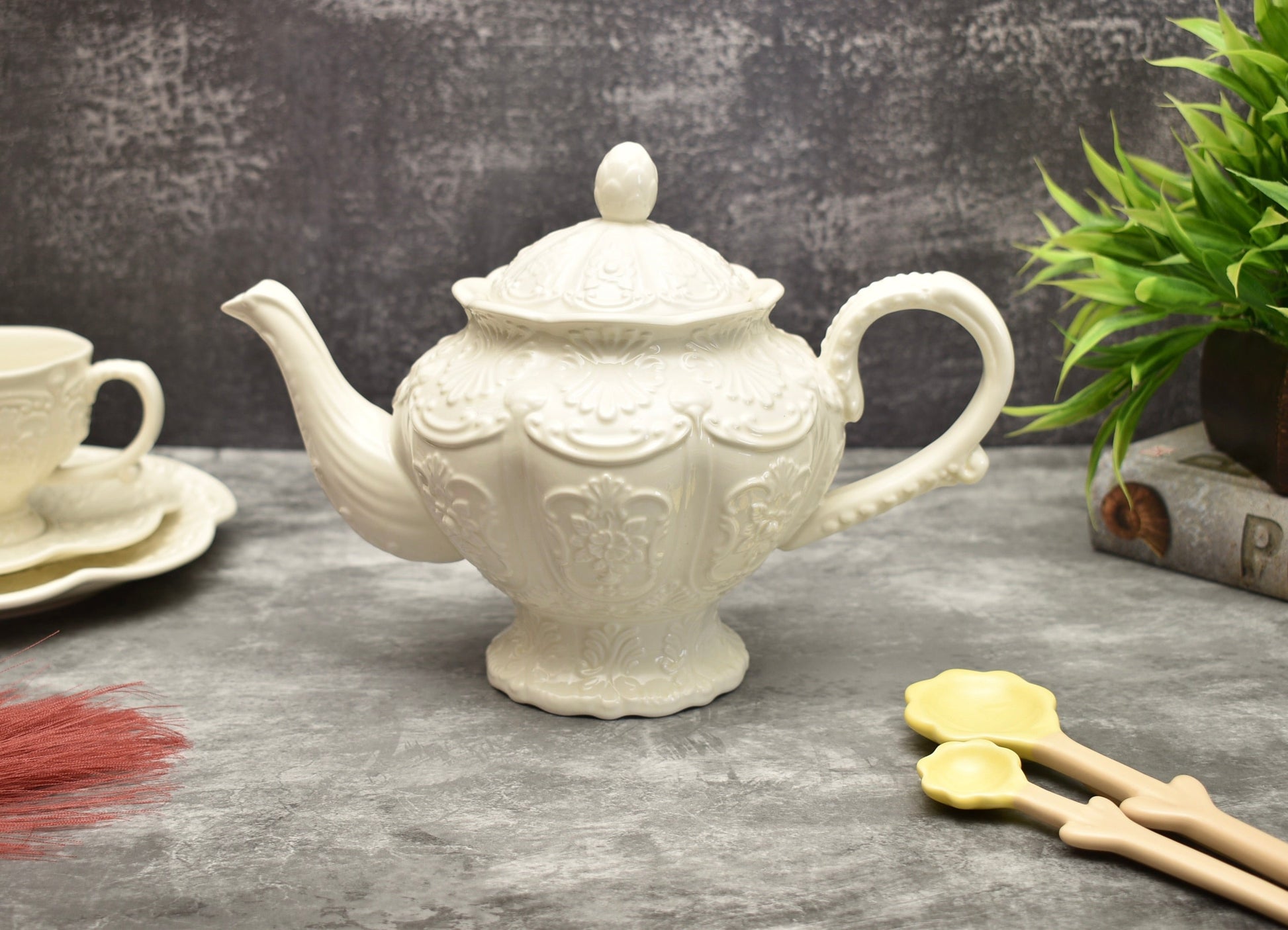 https://peppylittlethings.com/cdn/shop/products/brittany-white-ceramic-teapot-199770.jpg?v=1692435507&width=1946